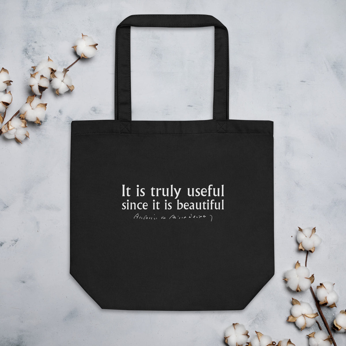 Little Prince quote tote bag 'It is truly useful since it is beautiful' Antoine de Saint-Exupéry, black mockup