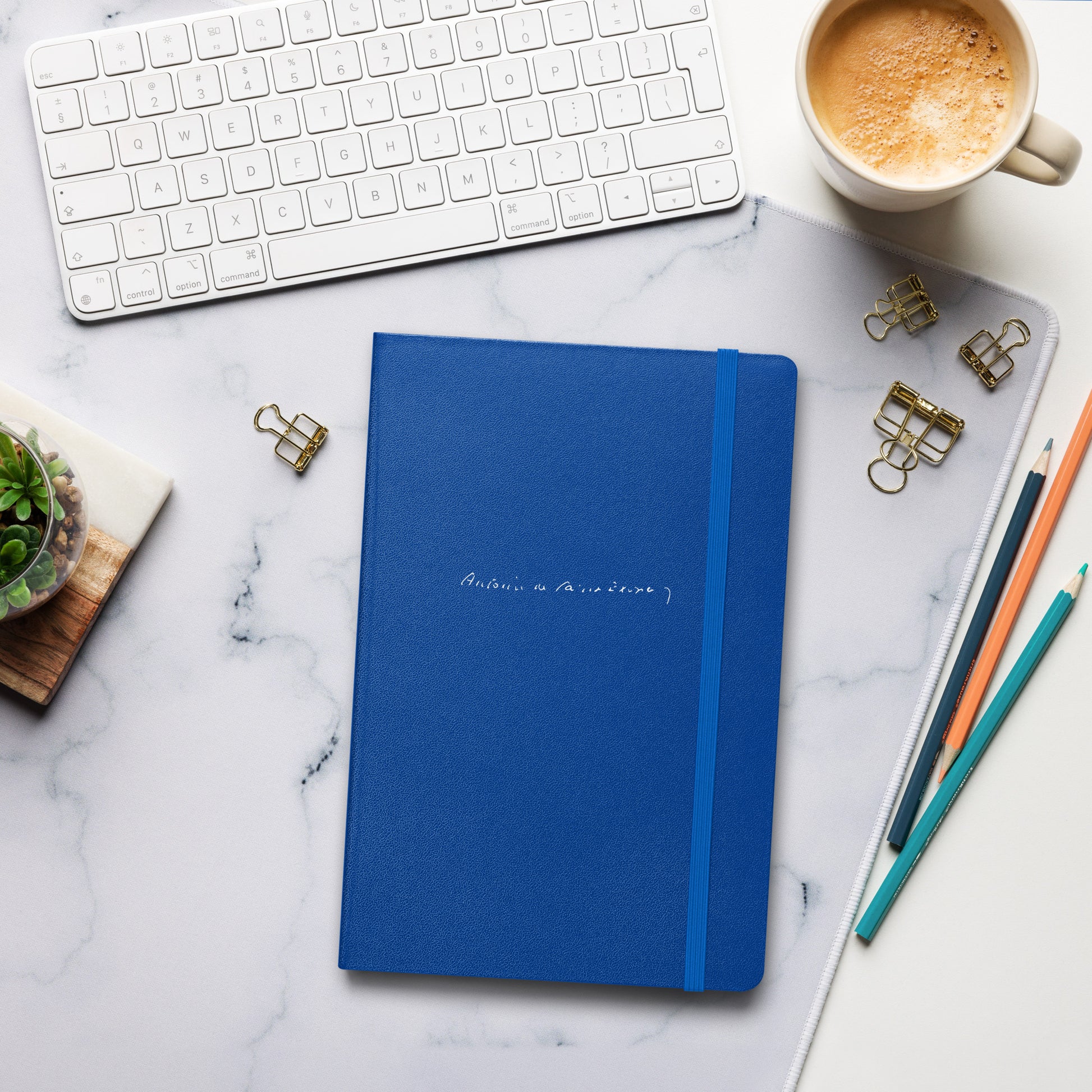 Antoine de Saint-Exupery signature blue notebook lifestyle