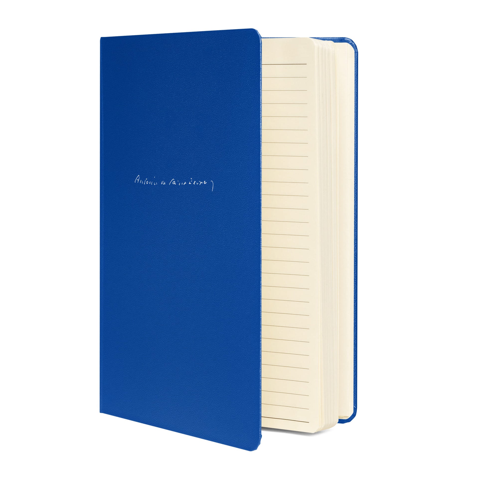 Antoine de Saint-Exupery signature blue notebook side view