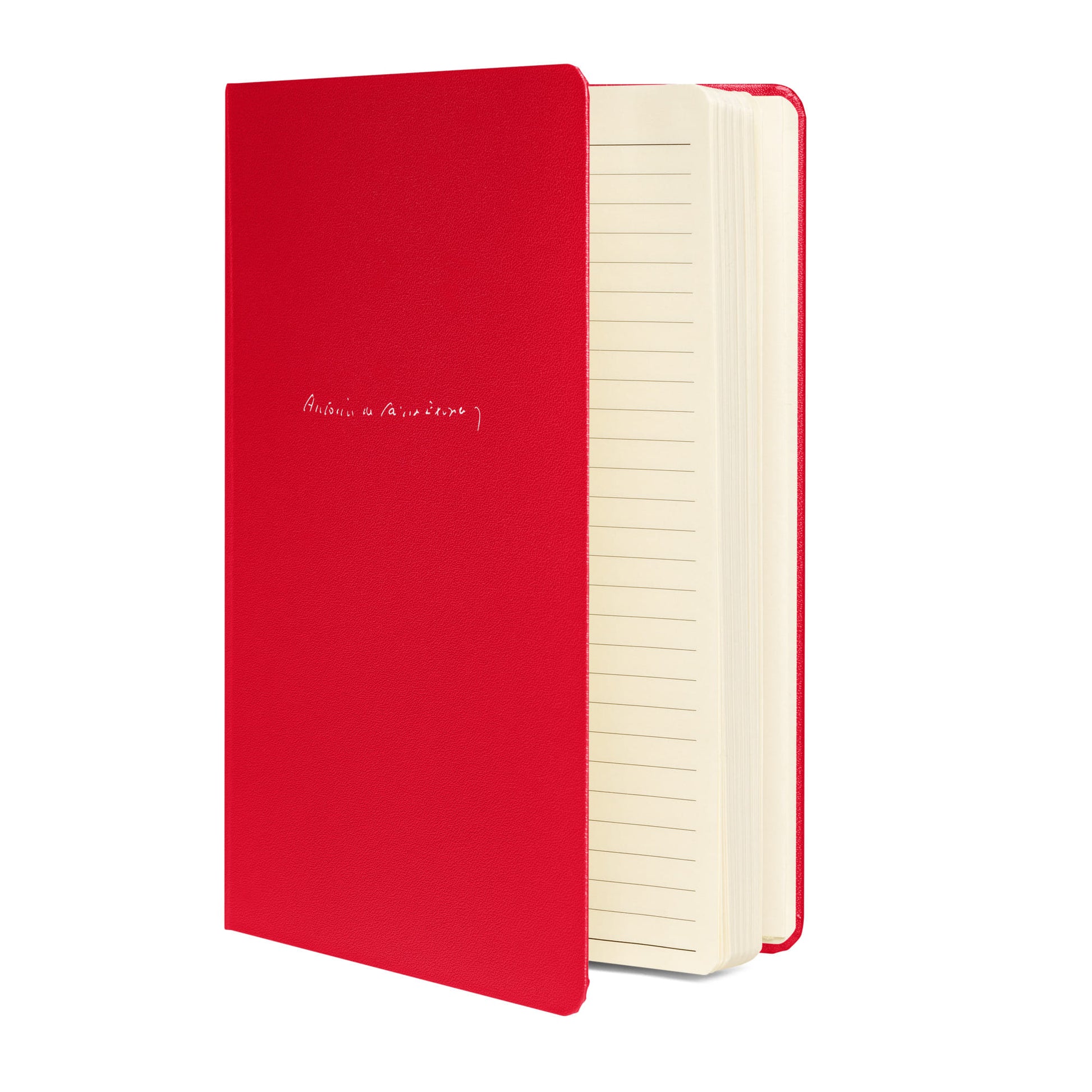 Antoine de Saint-Exupery signature red notebook side view