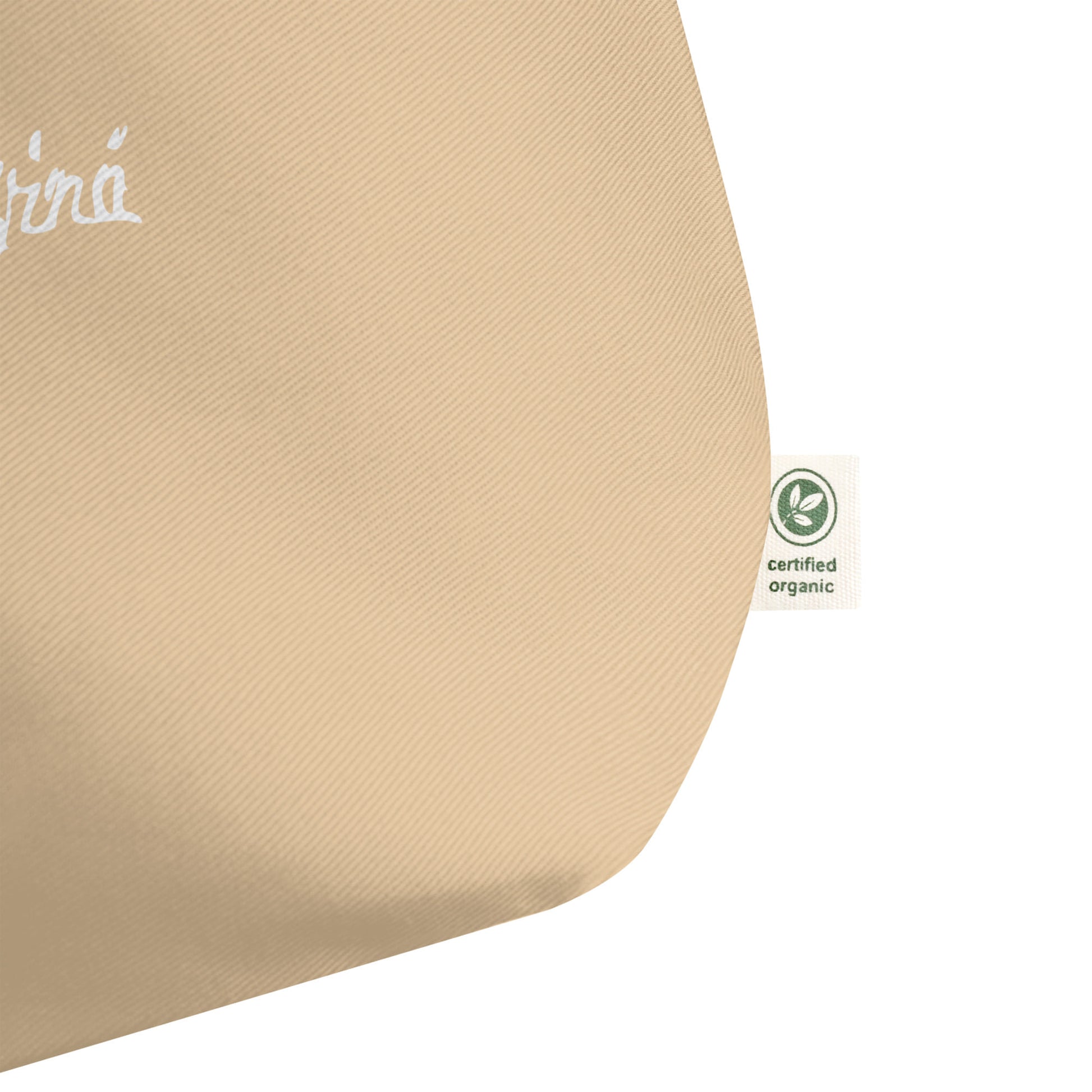 Leonardo da Vinci signature organic beige shopper bag tag detail